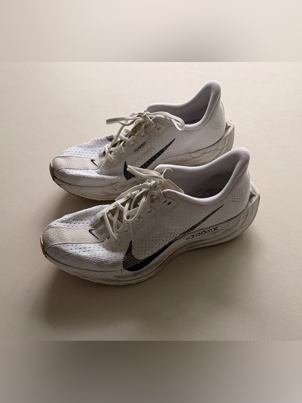 Nike Men’s White and Black ZoomX Flyknit Running Sneakers